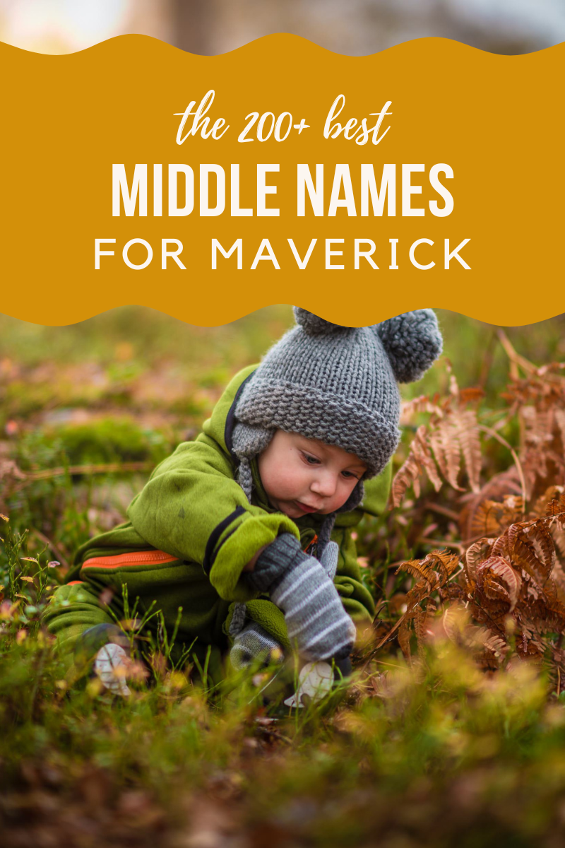 boy sitting in nature with winter hat and gloves on